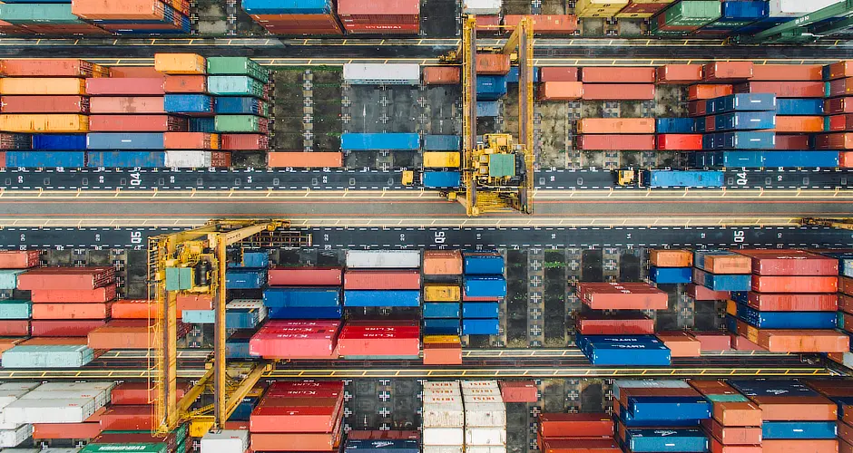 Aerial view of shipping containers using a solution to track and trace in logistics