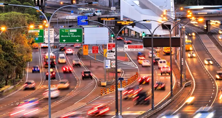 Cars driving on a busy road