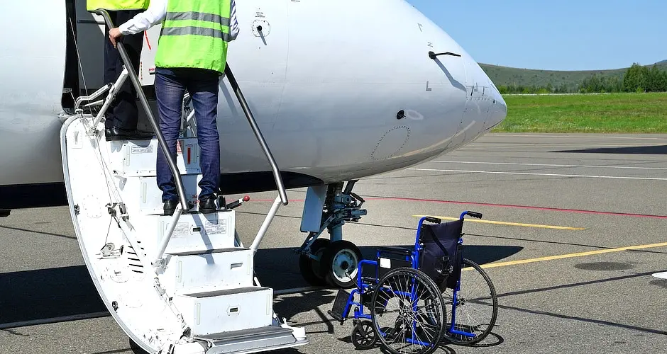 Wheelchair at the bottom of the stairs of an aeroplane using asset tracking technology